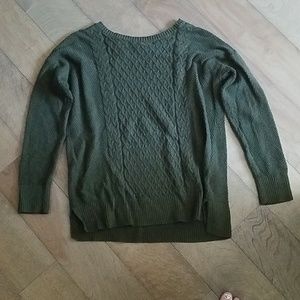 dark green knit sweater.